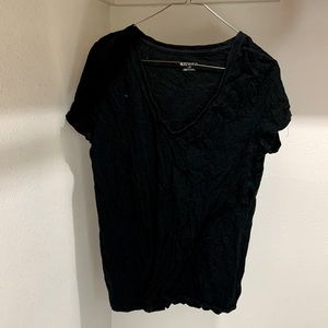 Black v neck shirt.